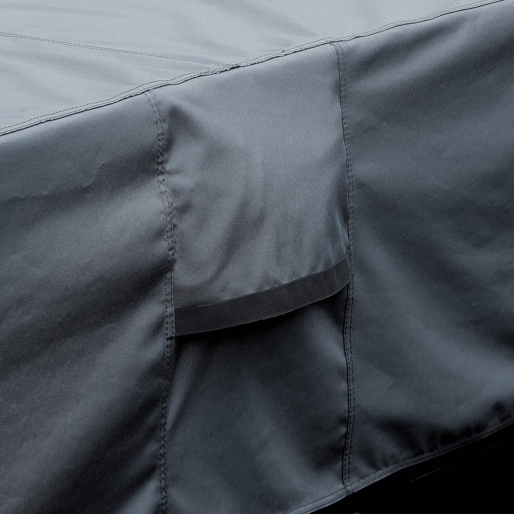 Hot tub cover corner seam with reinforced stitching and overlapping fabric flap