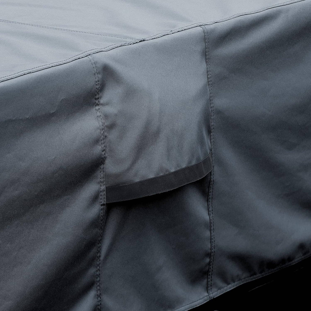Hot tub cover corner seam with reinforced stitching and overlapping fabric flap