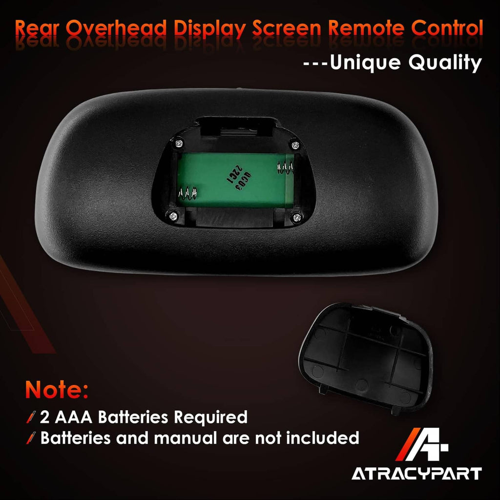 Black rear overhead display remote control with opened battery door and battery area