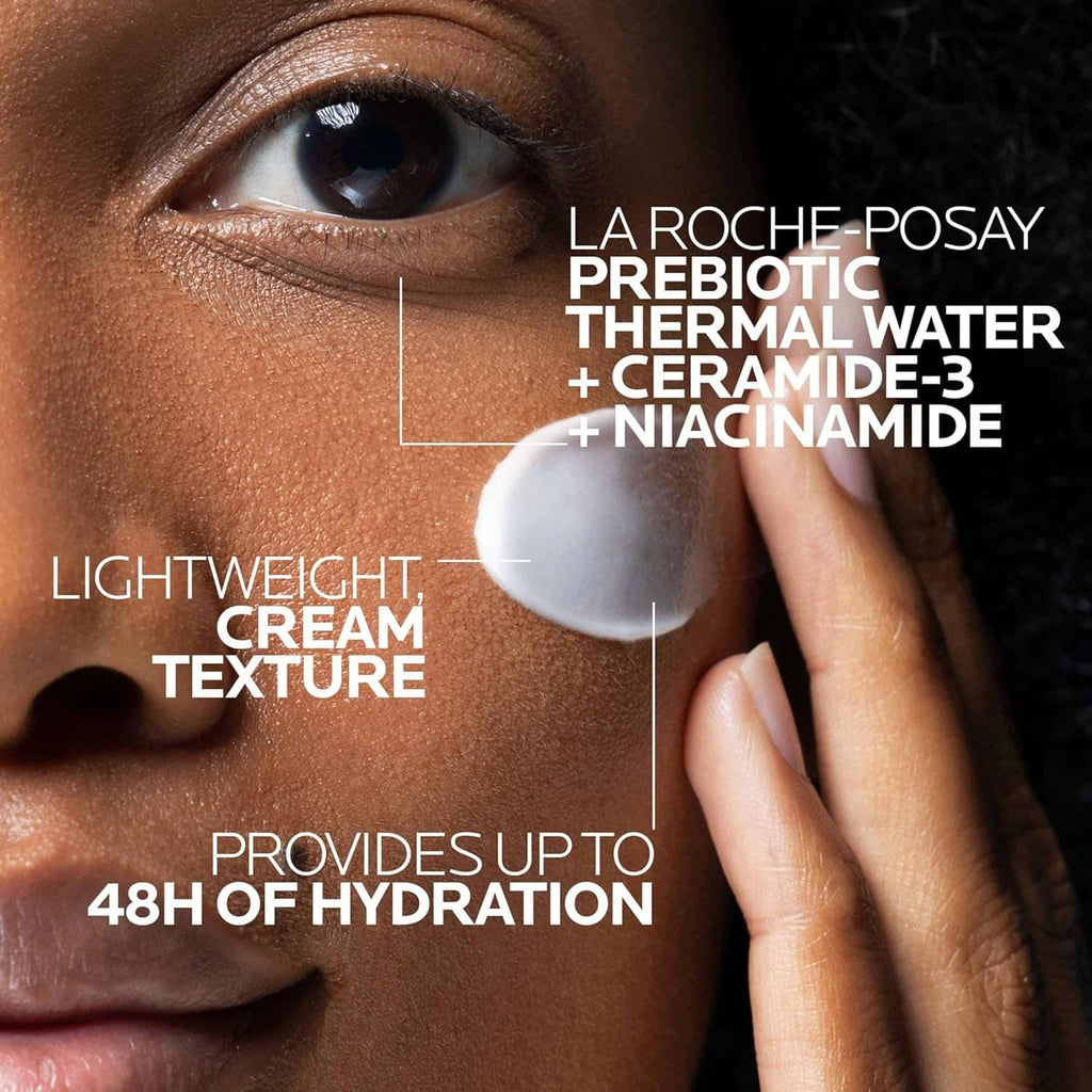 Cream texture on face near eye with La Roche-Posay Toleriane Double Repair text