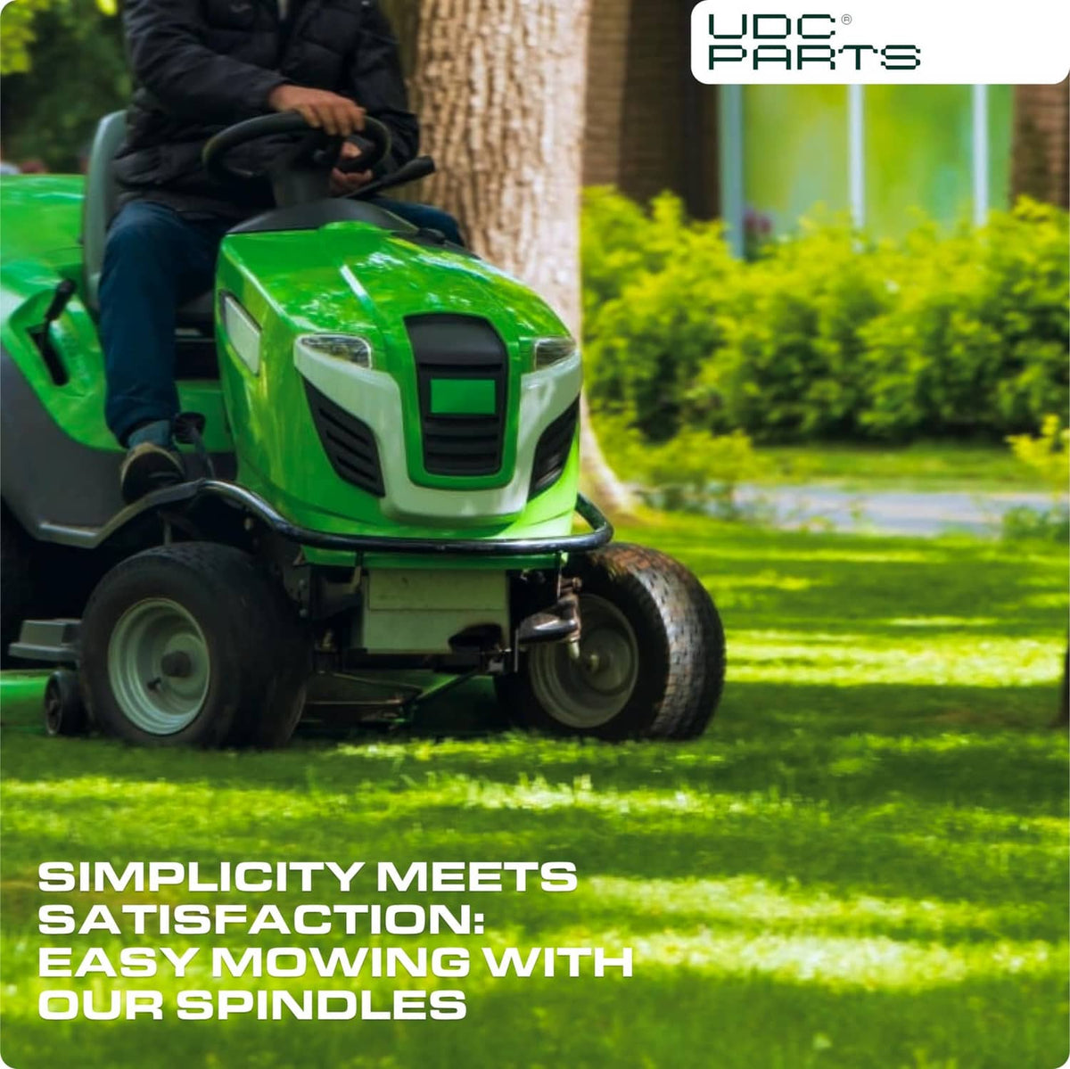 Lawn mower with operator seated, outdoors cutting grass