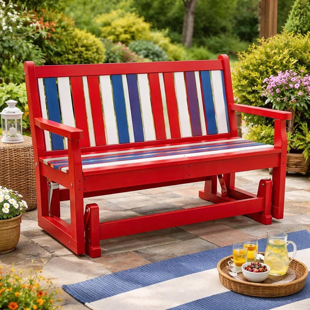Outdoor patio glider bench with red frame and striped backrest slats