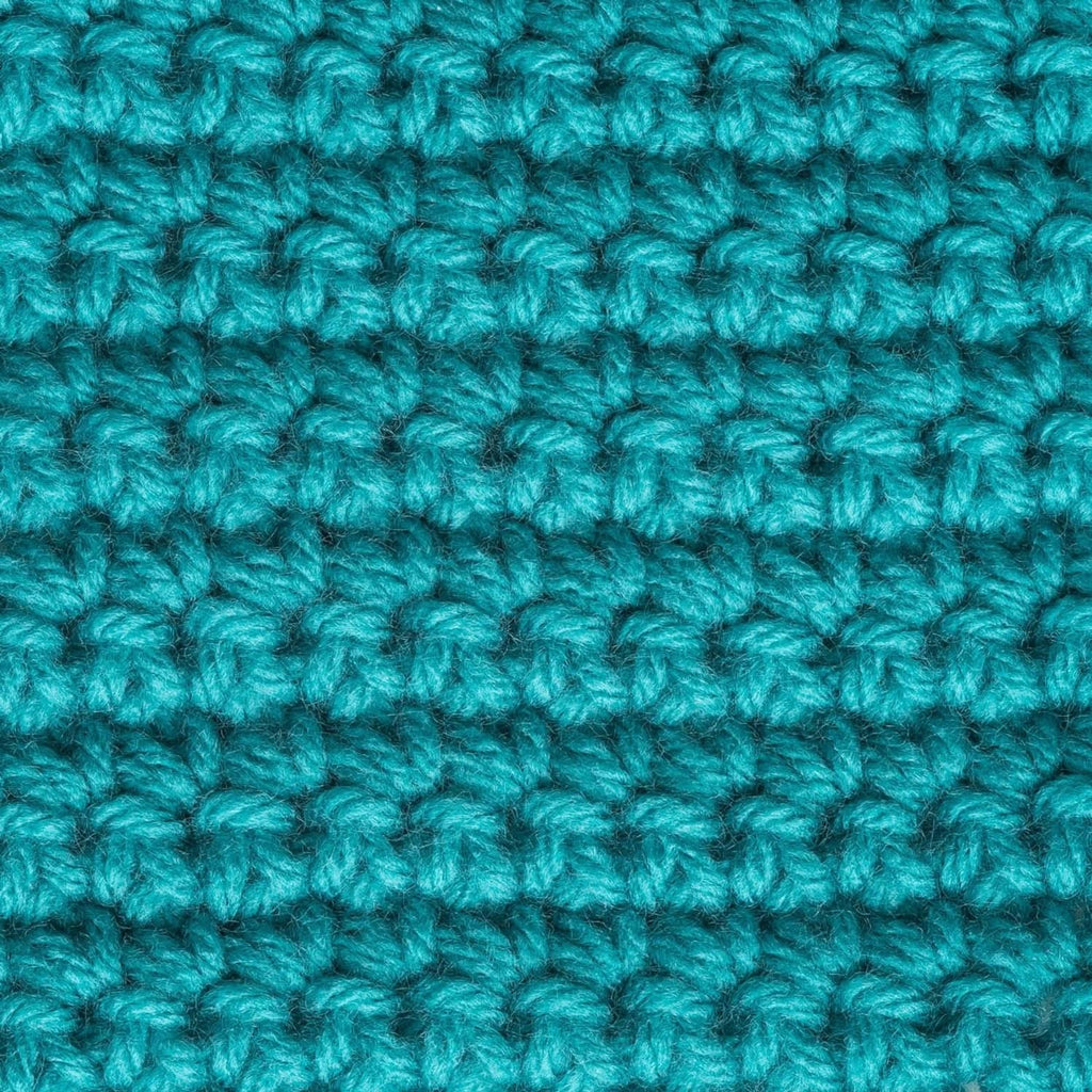Teal crochet stitch swatch with repeating loops, textured surface