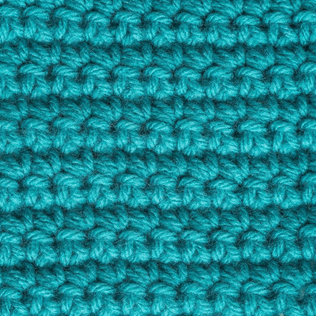 Teal crochet stitch swatch with repeating loops, textured surface