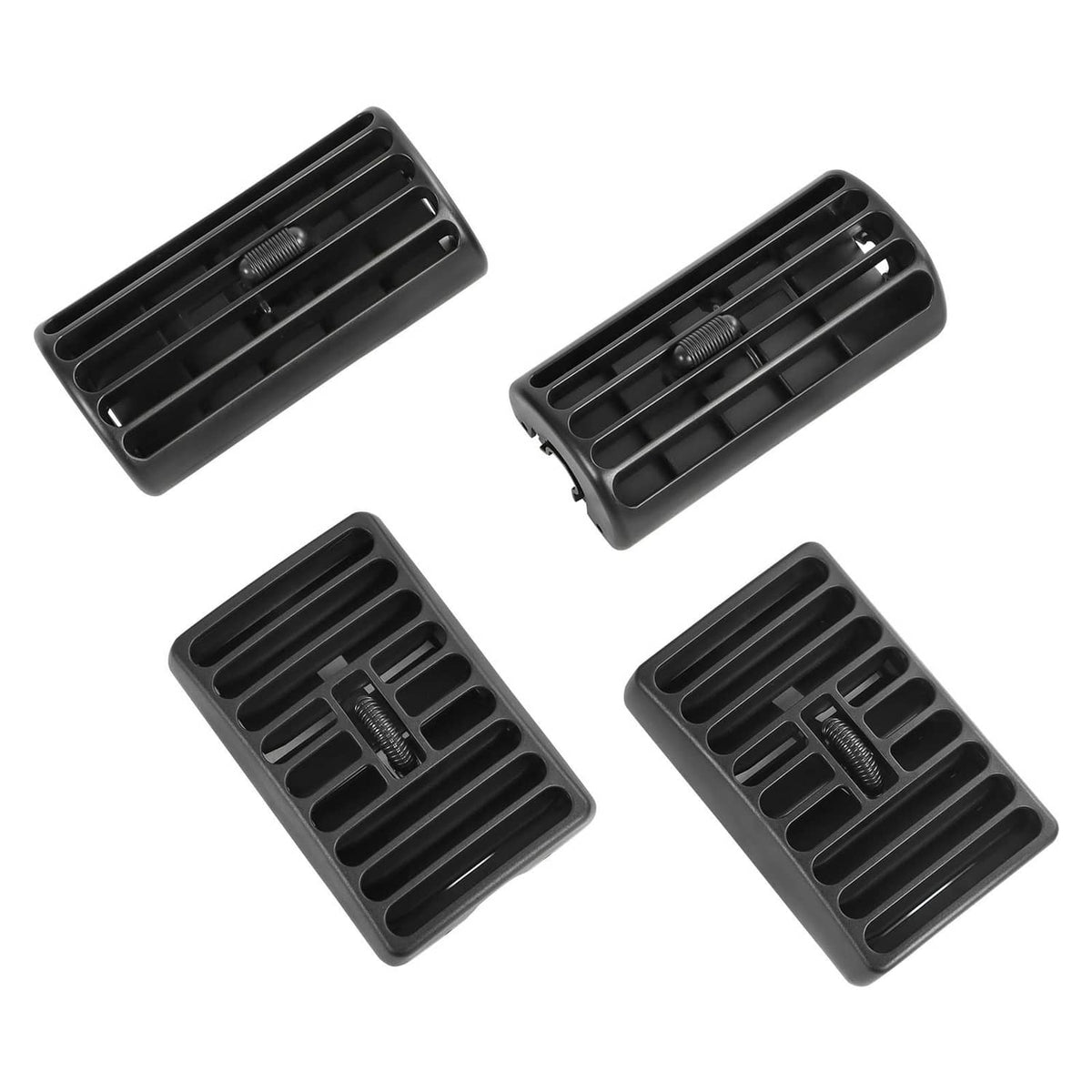 Set of four black rectangular AC vent grilles with horizontal louvers and central knob.