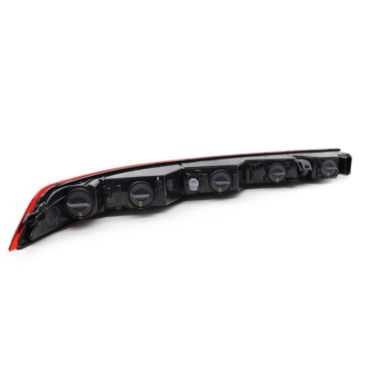 Rear tail light lamp with black housing, red outer trim, inner bulb housings visible