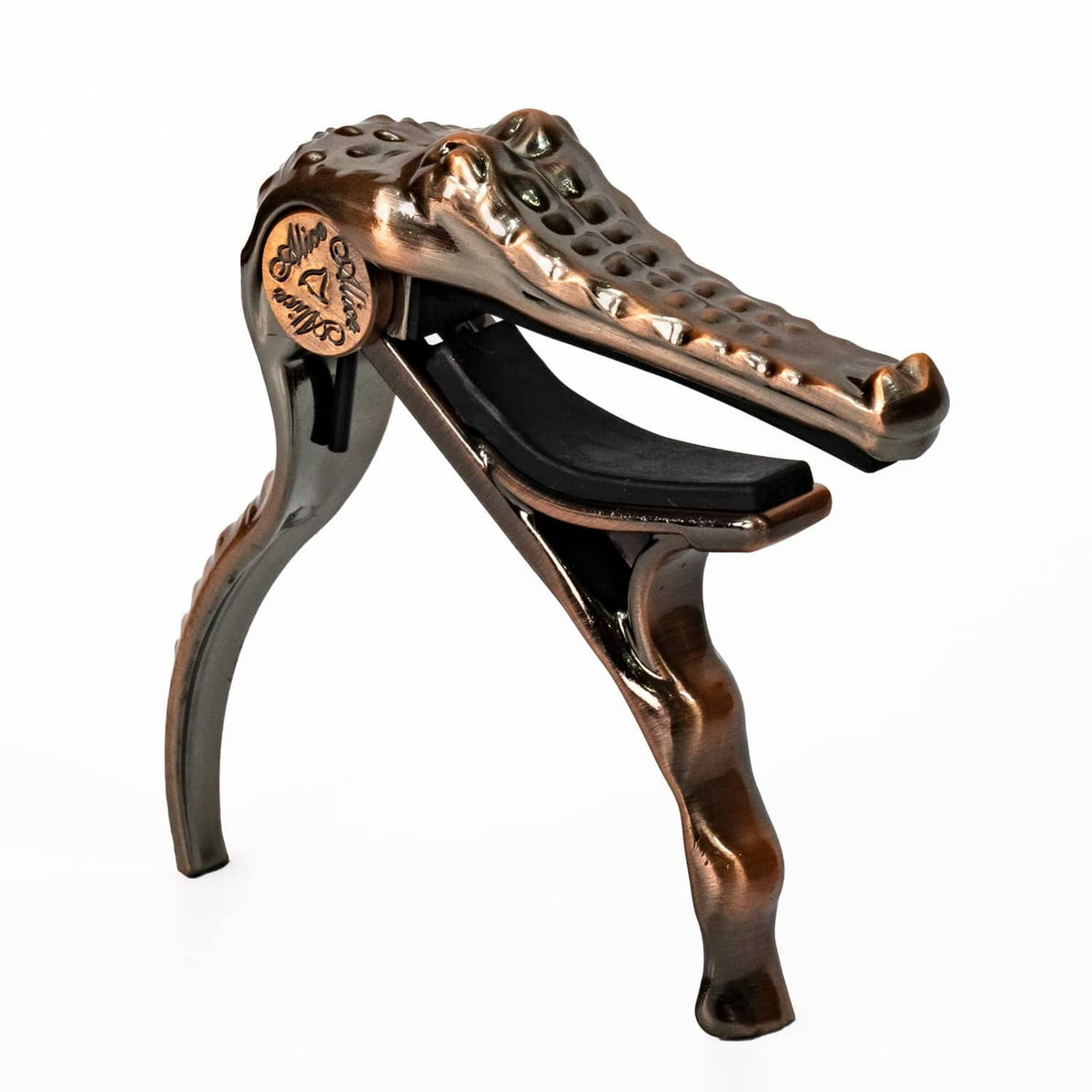 Bronze alligator-style guitar capo with spring clamp and curved handle