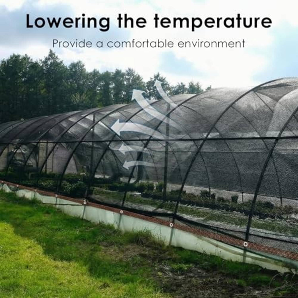 Dark gray shade cloth tarp canopy stretched on outdoor frame for cooling