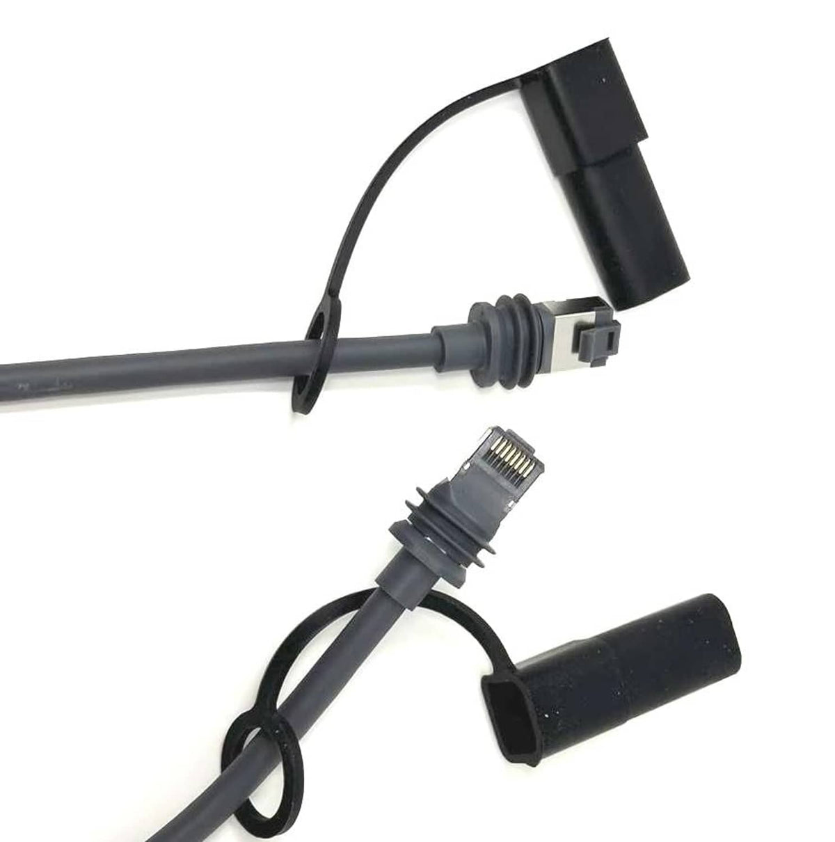 Black silicone end caps with lanyard loops on cable connectors