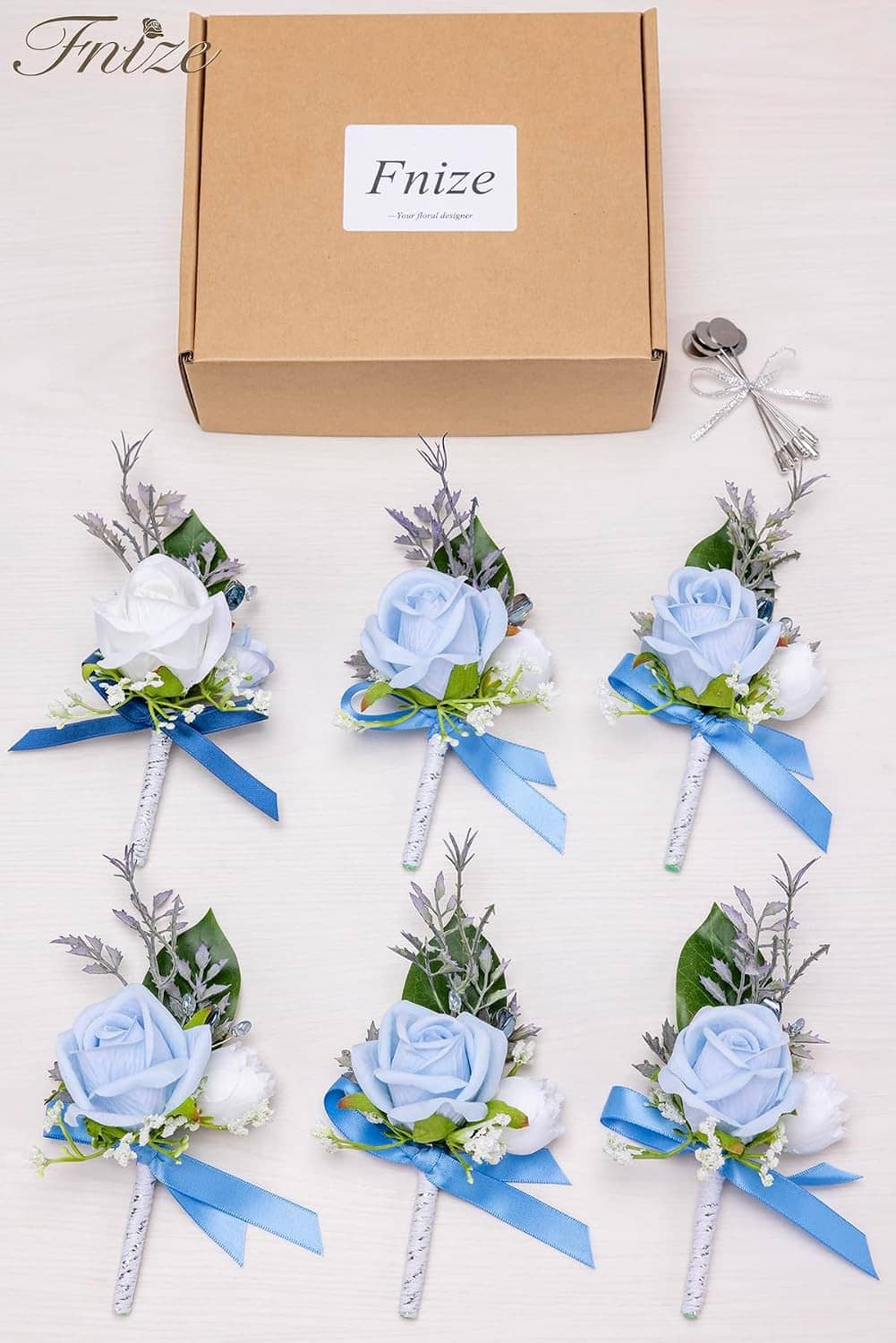 Set of six blue rose and white flower boutonnieres with hanging tie ribbon