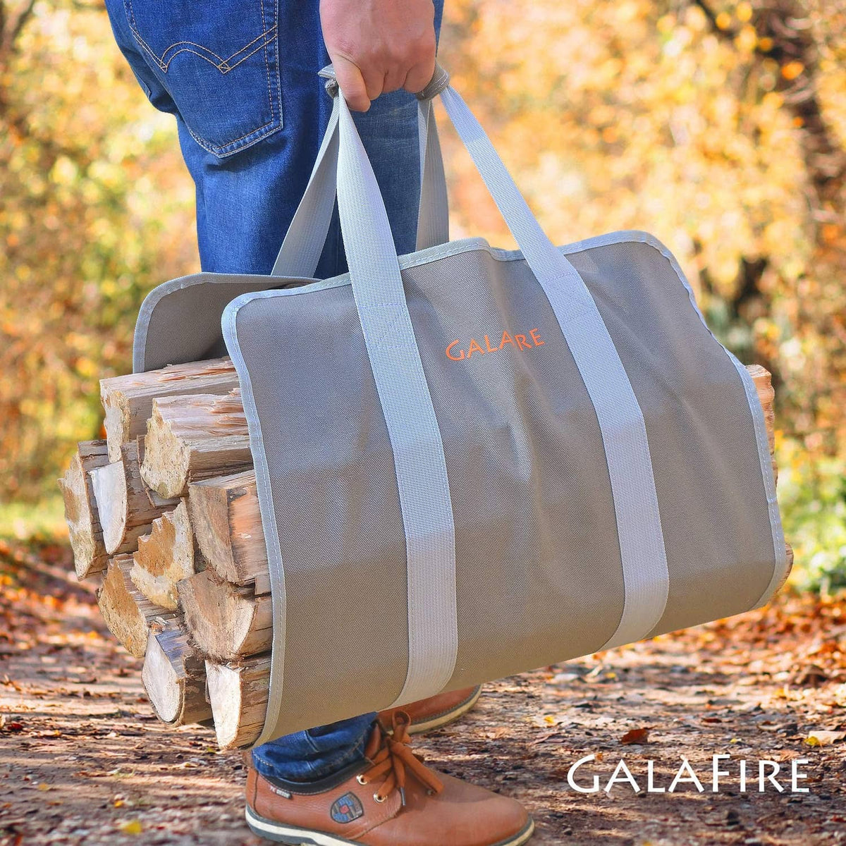 Gray foldable firewood carrier with light blue straps and front tote opening
