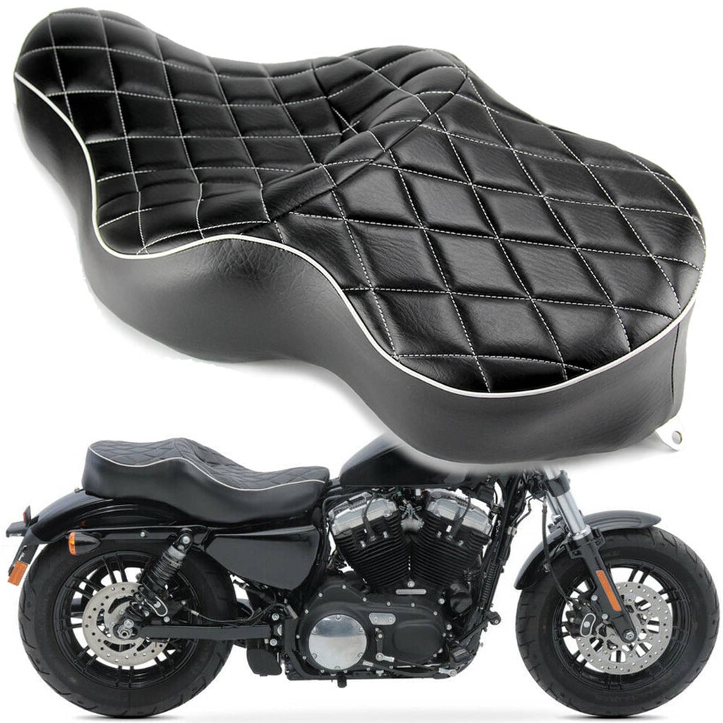 Black two-up motorcycle seat cushion with diamond quilting and light piping trim