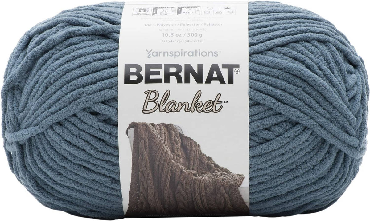 Bernat super bulky yarn skein in stormy blue-green, with brand label on center band