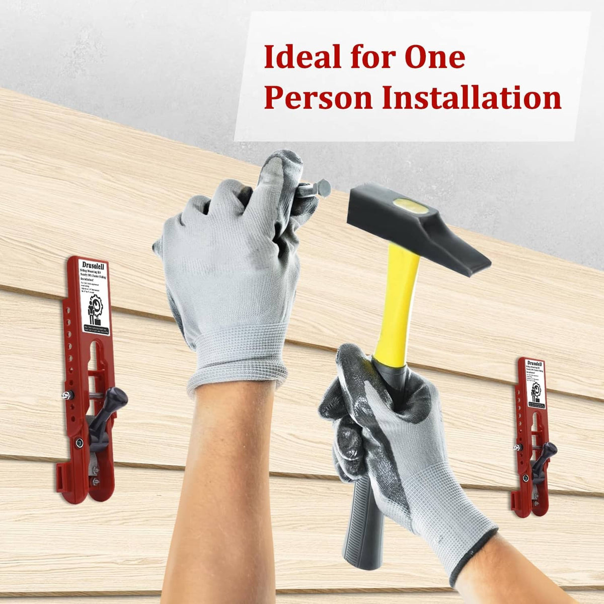 Red siding mounting tools on wood siding, with gloved hands adjusting one tool
