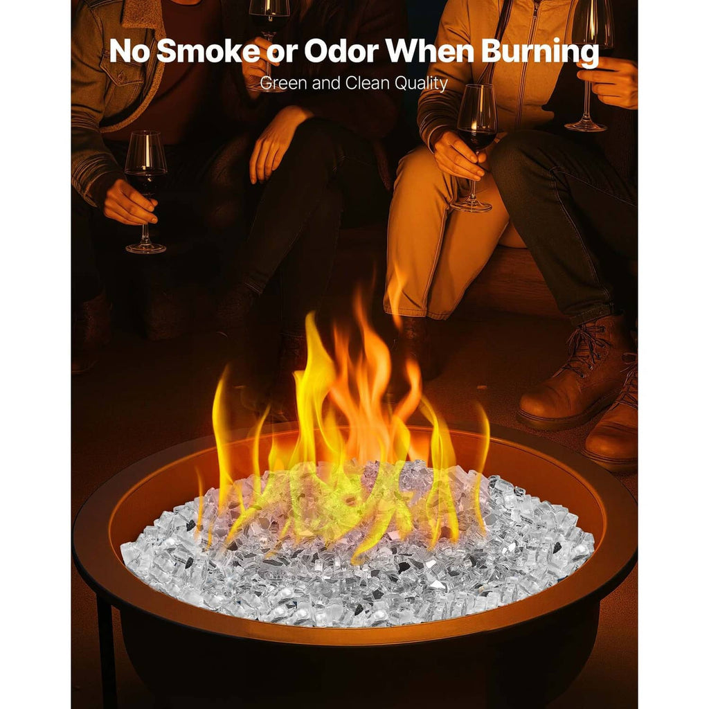 Clear crushed glass fire pit gems in a round bowl with active flames and heat glow