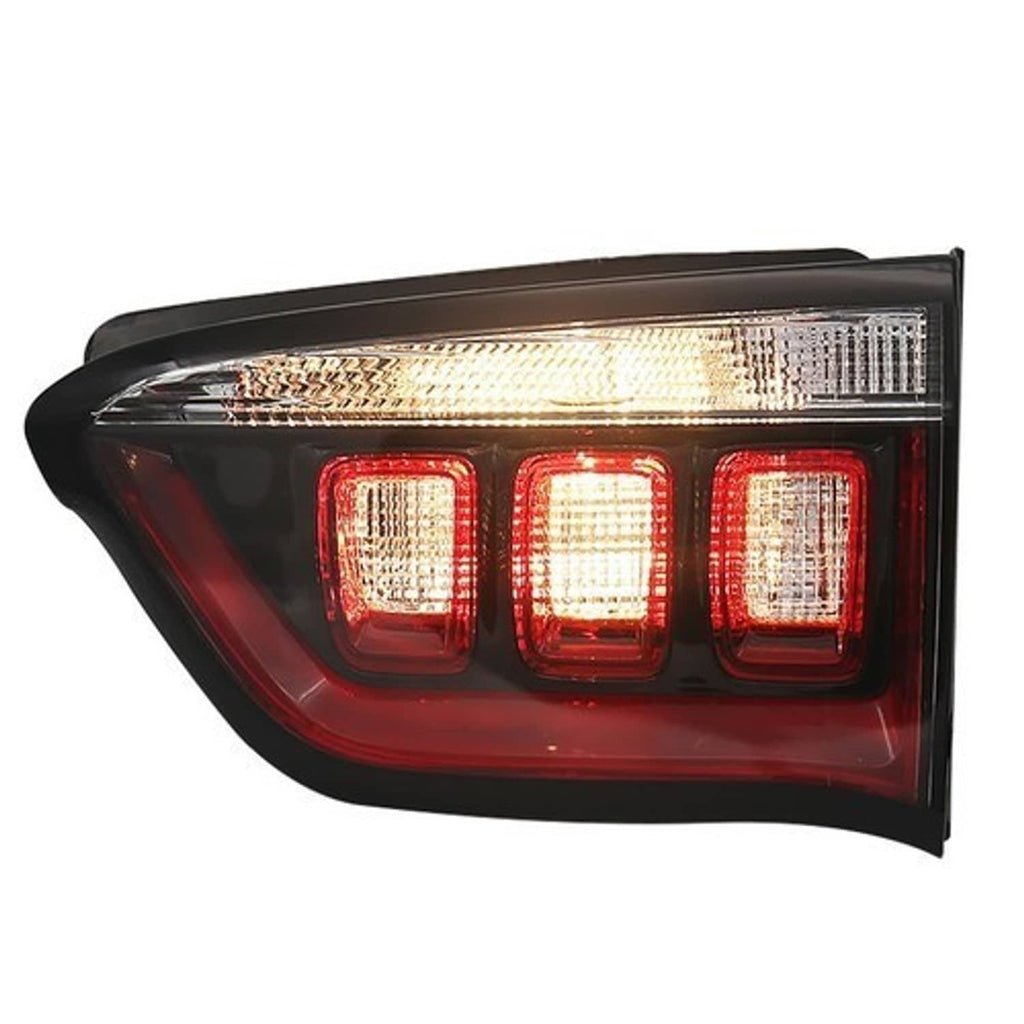 Right inner halogen tail light assembly, three red lenses with clear reflector strips