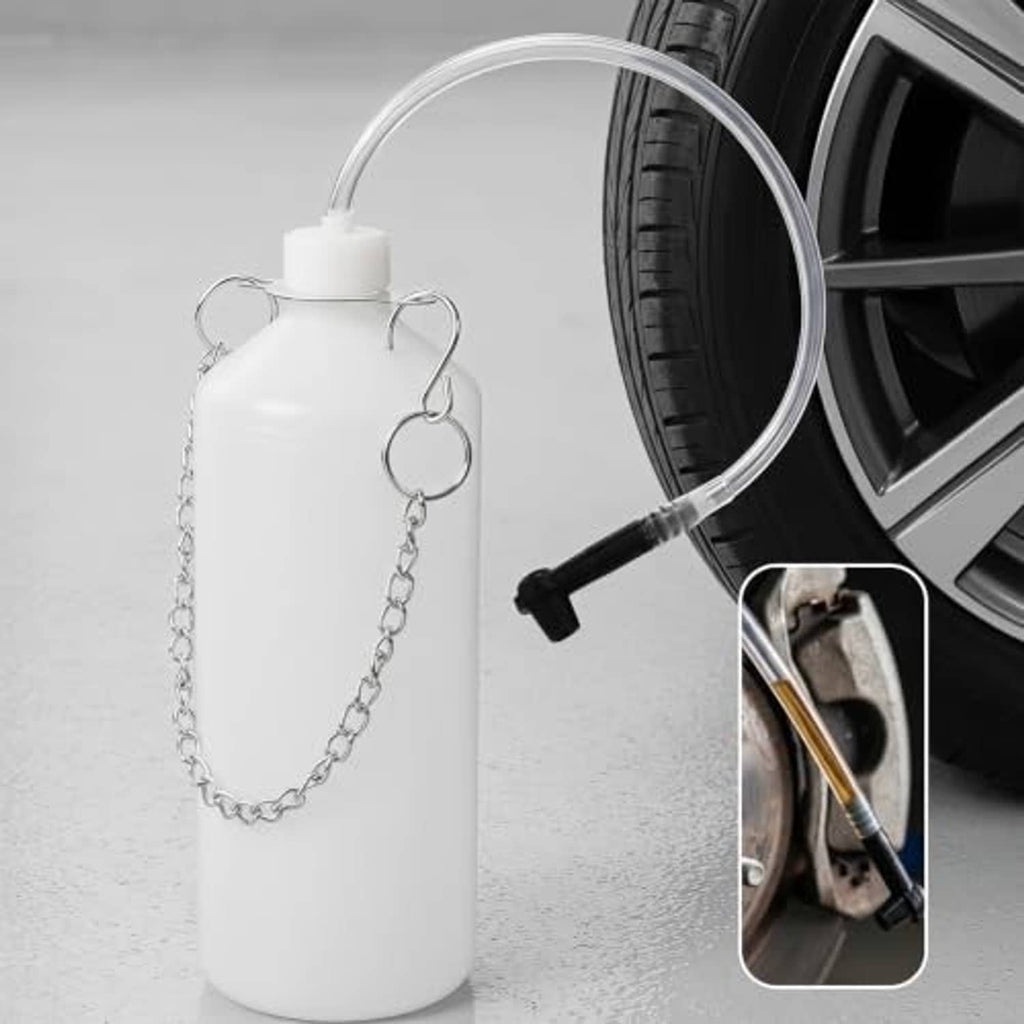 White brake bleeder bottle with chain hanger and clear hose connected to black pump