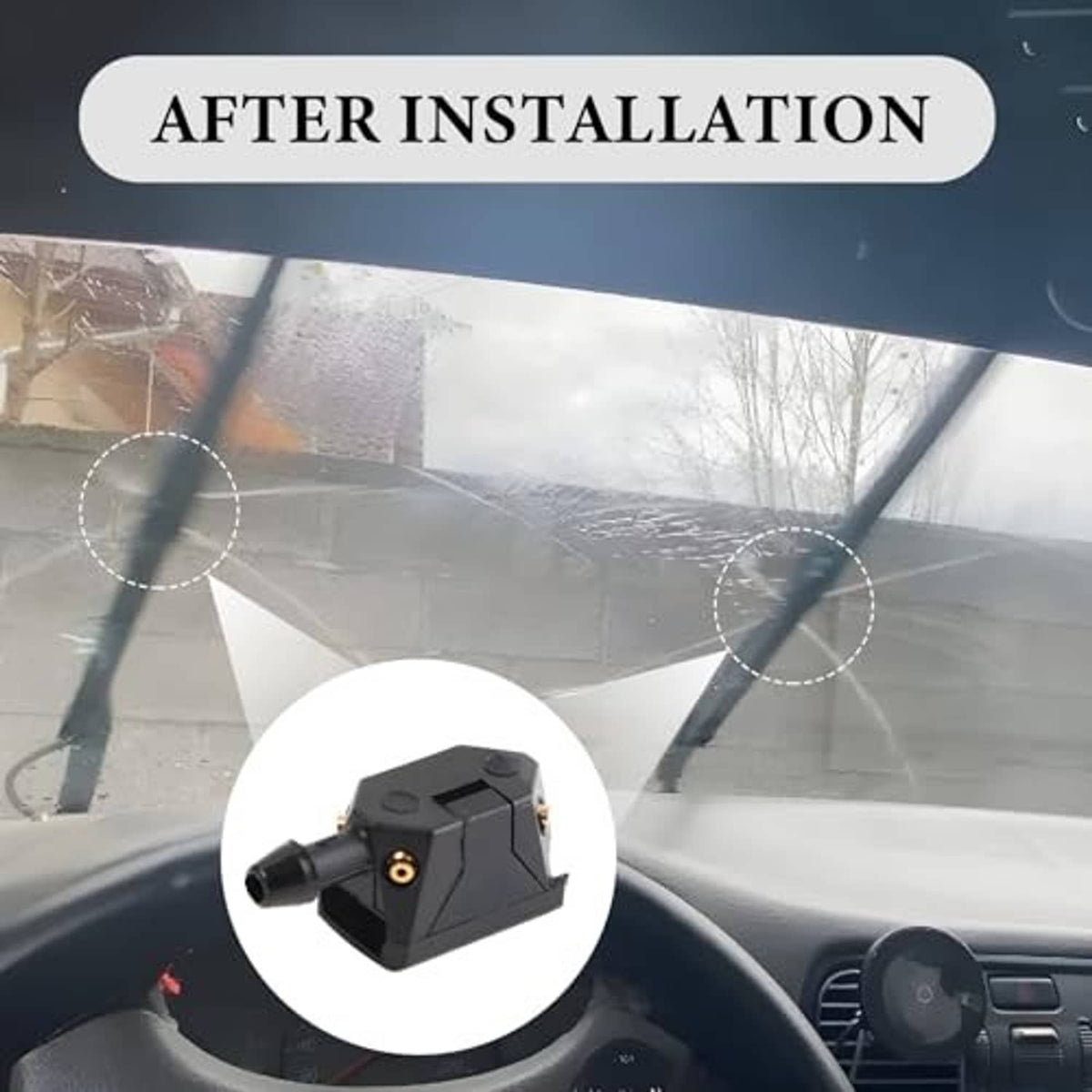 Black windshield washer nozzle mounted on wiper arm after installation