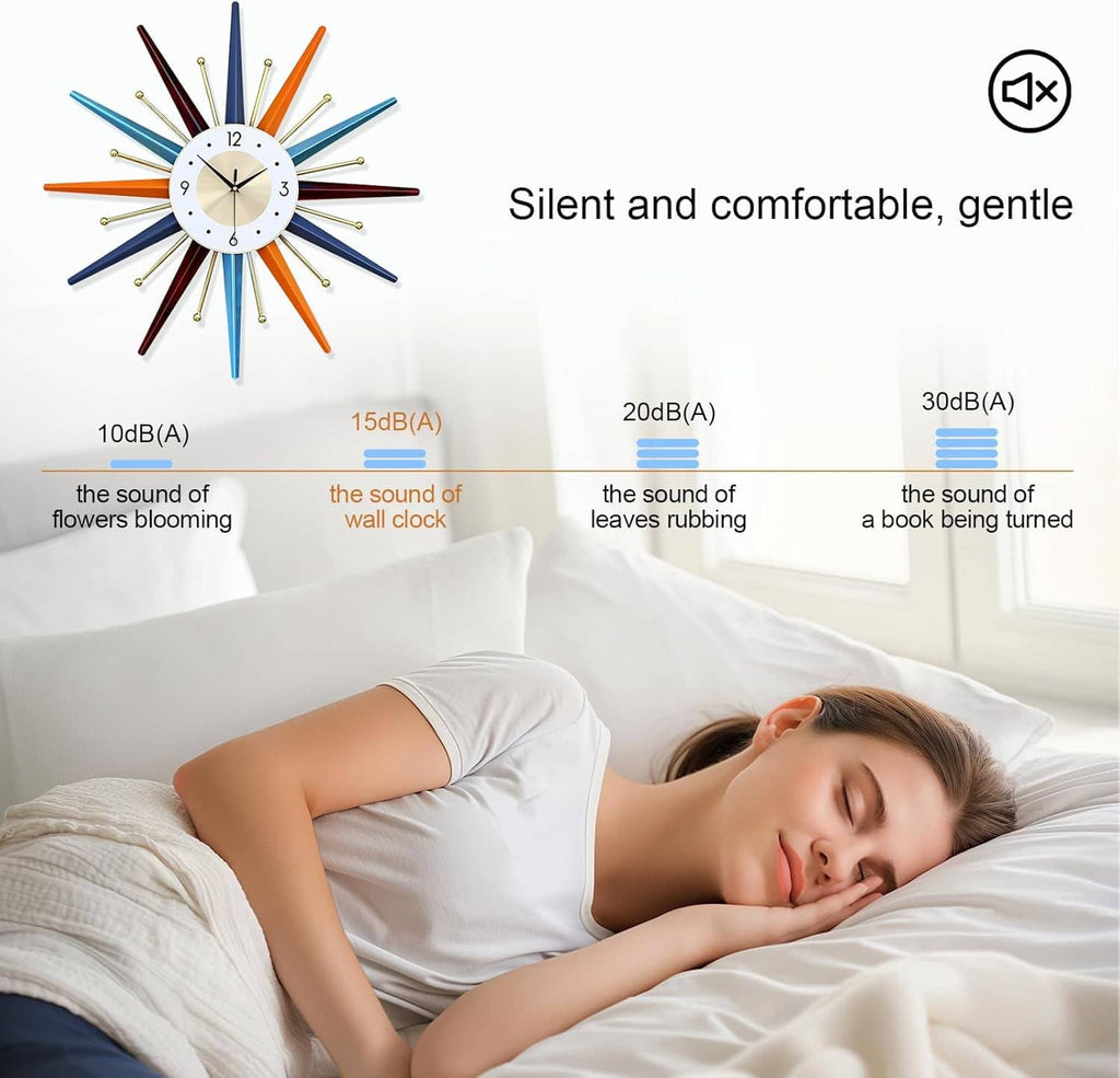 Starburst wall clock with multicolor rays and white dial above a bed.