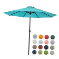 Turquoise patio table umbrella with open canopy and central pole stand