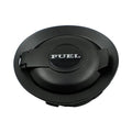 Matte black fuel gas door cover with “FUEL” emblem on the round face