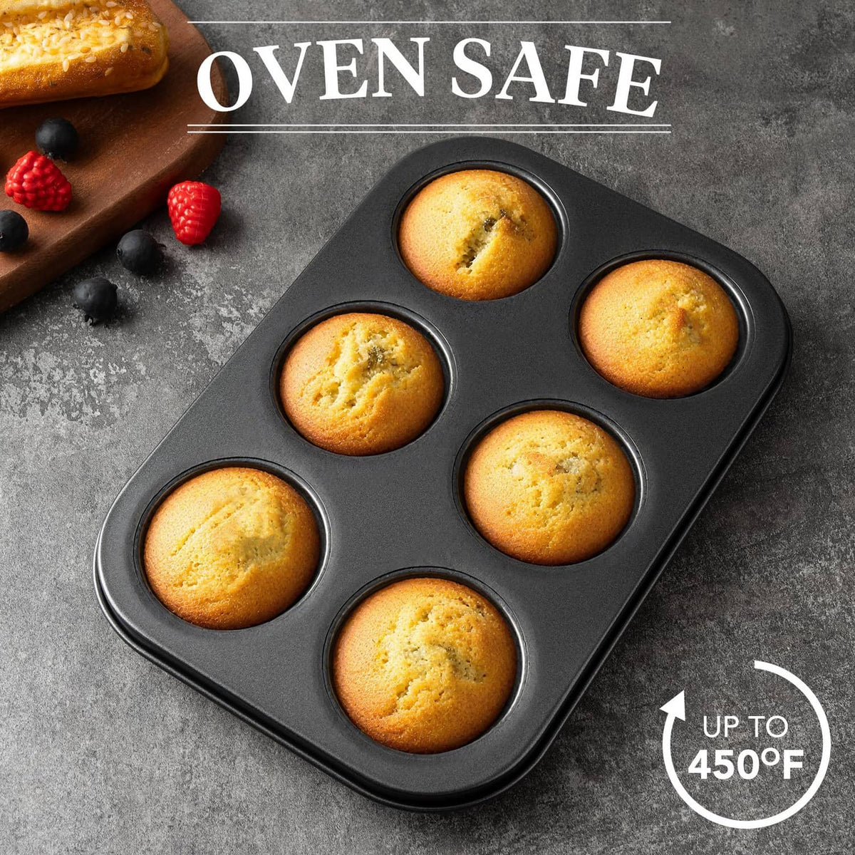 Mini fluted tube cake pan with six golden cakes, dark nonstick mold surface