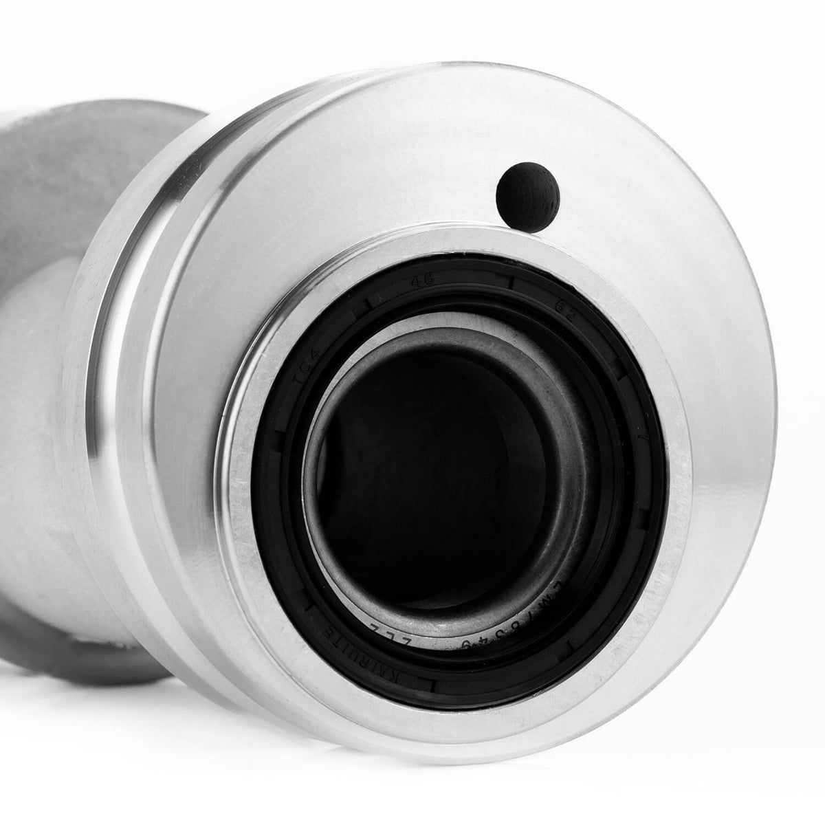 Rear axle bearing housing carrier hub close-up of black inner seal inside metal ring