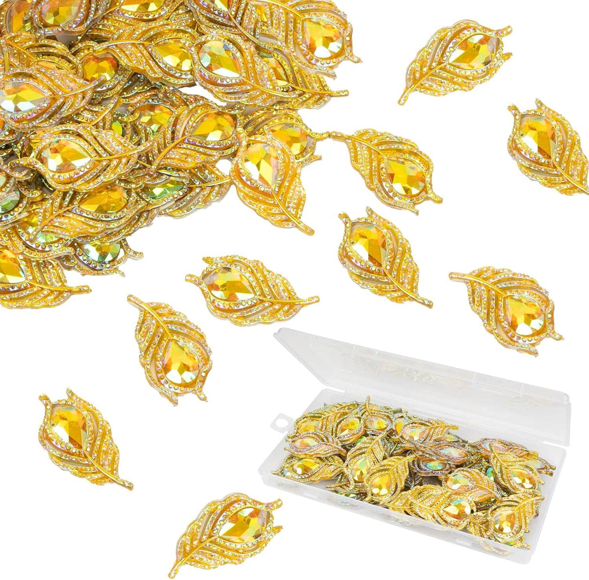 Gold rhinestone feather flatback embellishments with iridescent stones, loose pieces