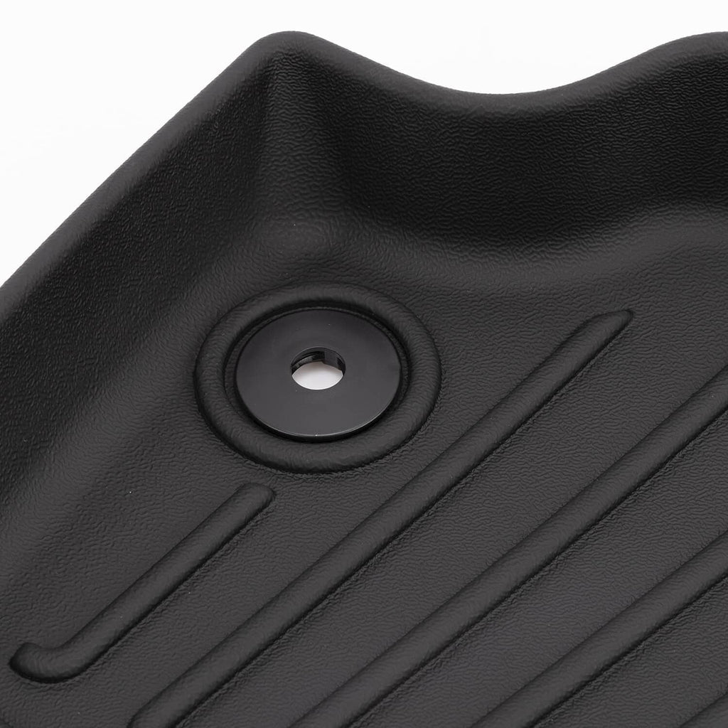 Black TPE floor mat grommet hole and textured grip ribs for a secure fit.