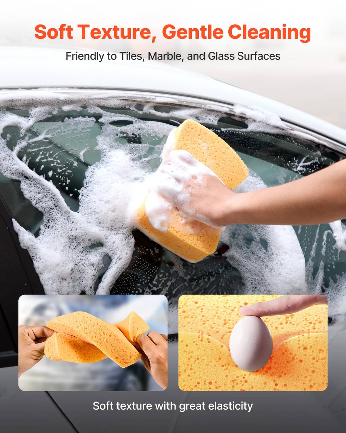 Orange-yellow foam sponge in hand for gentle cleaning on glass and tiles