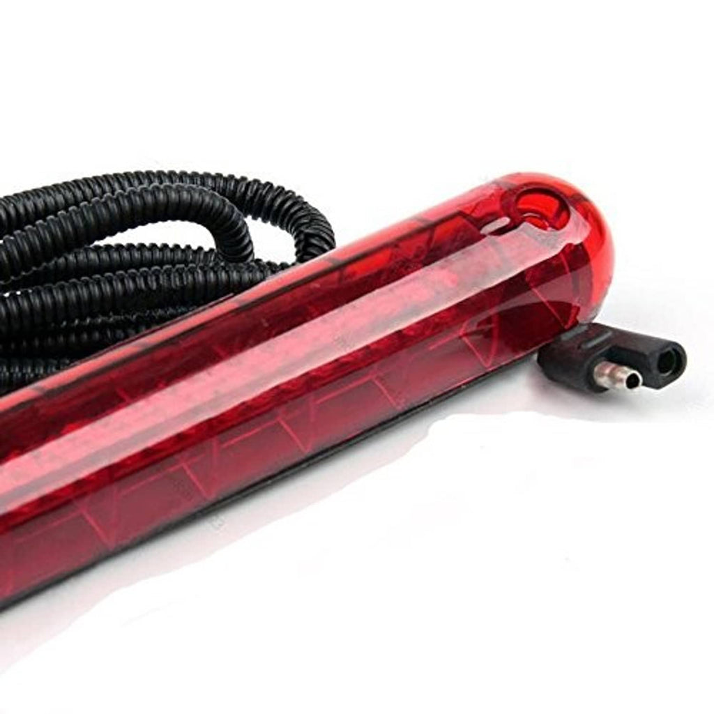 Close-up of red LED lens brake light bar with black wire connection