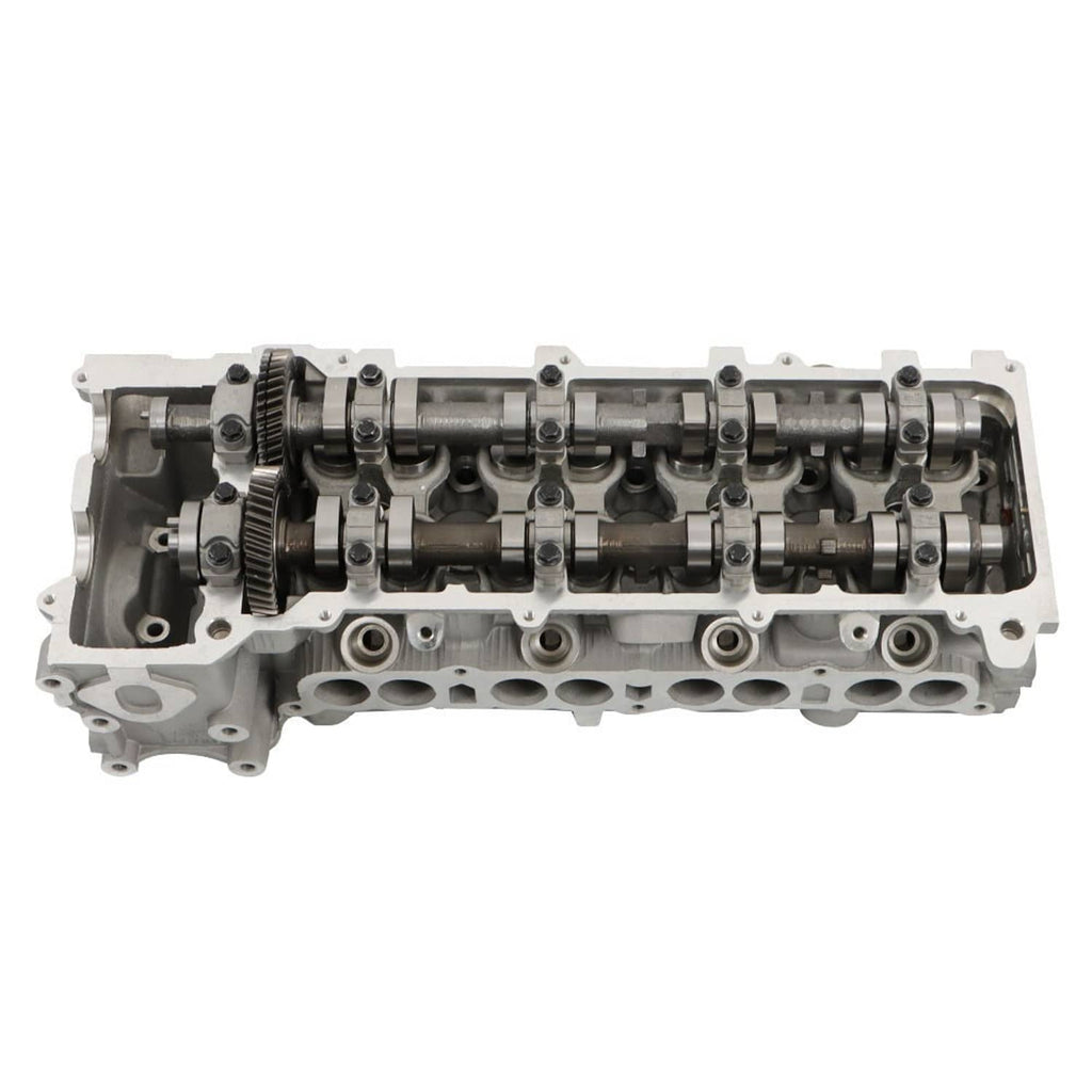 Cylinder head with camshaft assembly, side passages, and valve port cutouts