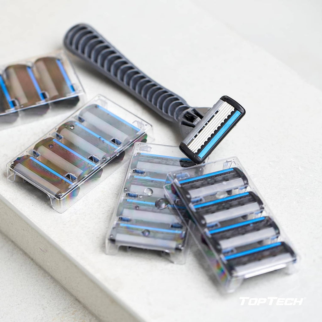 Razor refill cartridges and cartridge holder, blades visible in clear packaging