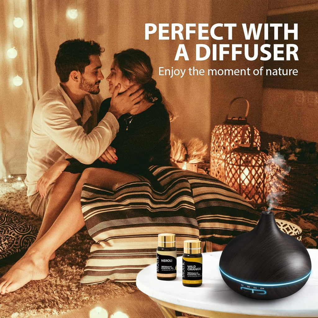 Couple with diffuser and small essential oil bottles for home fragrance display