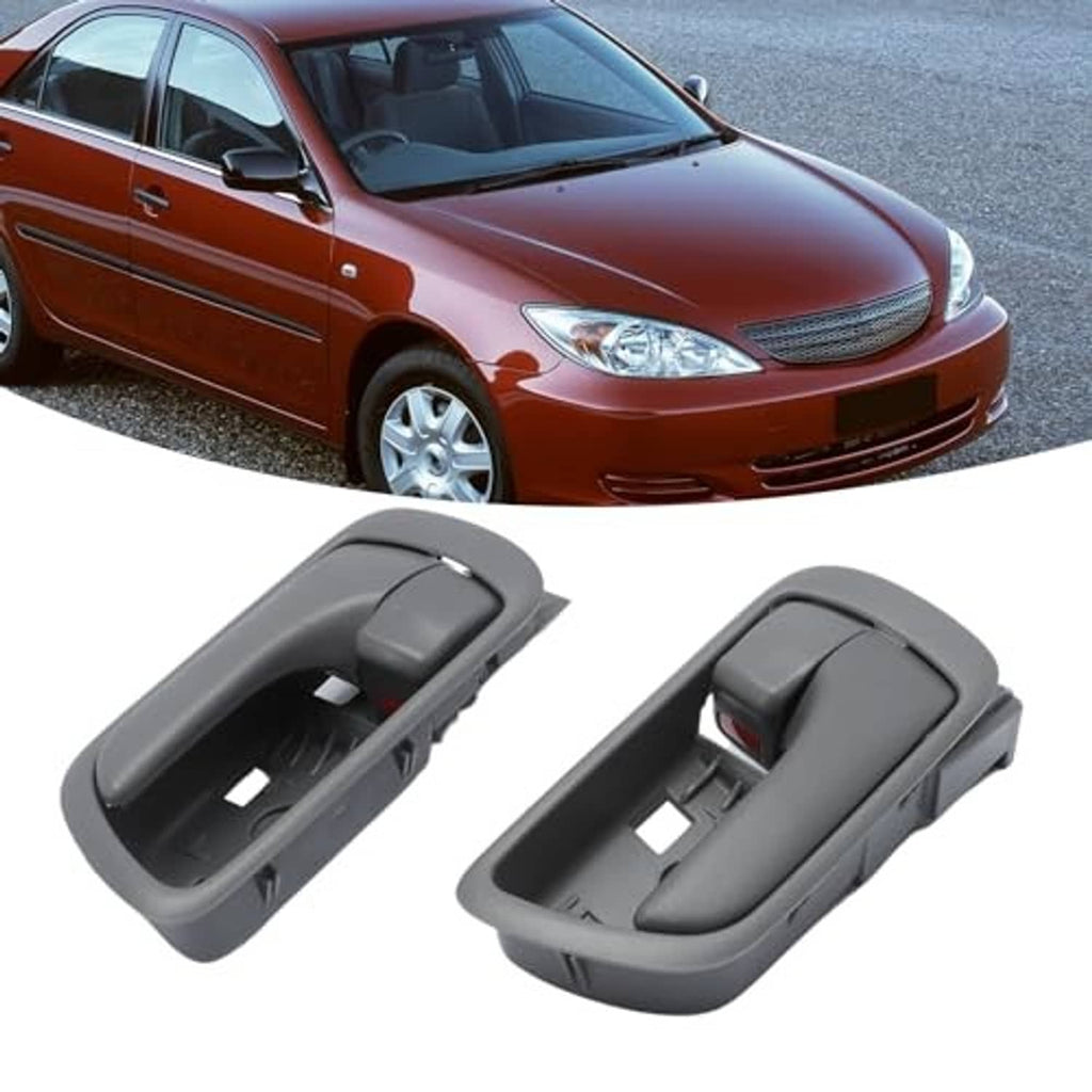 Gray interior door handle set with red switch, angled installed view