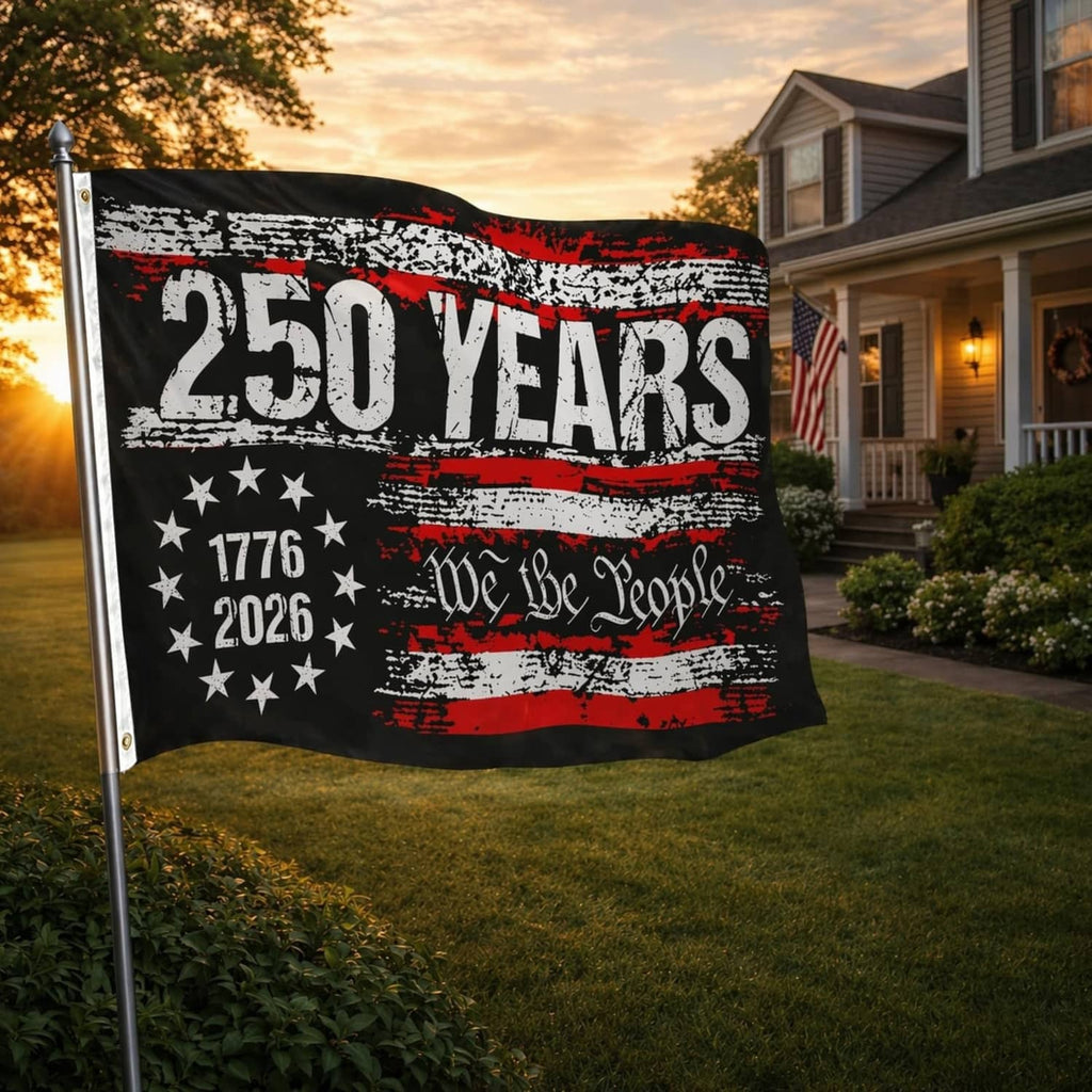 Black 250 years USA flag on a lawn with red and white distressed stripes, stars, and text