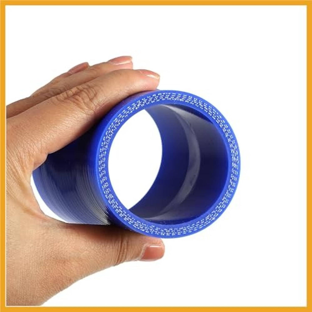 Blue straight silicone reducer hose coupler held in hand, open ends visible