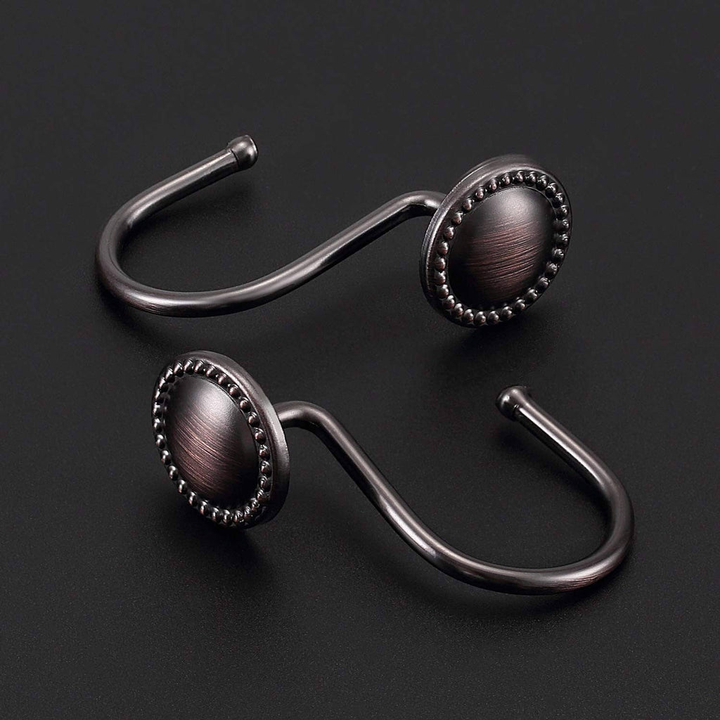 Oil-rubbed bronze shower curtain hooks with oval beaded rosettes and curved bars