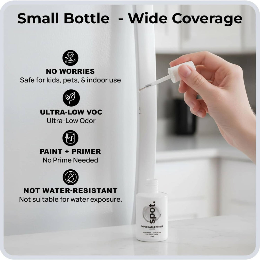 White touch-up paint bottle held near a cabinet door for precise application.