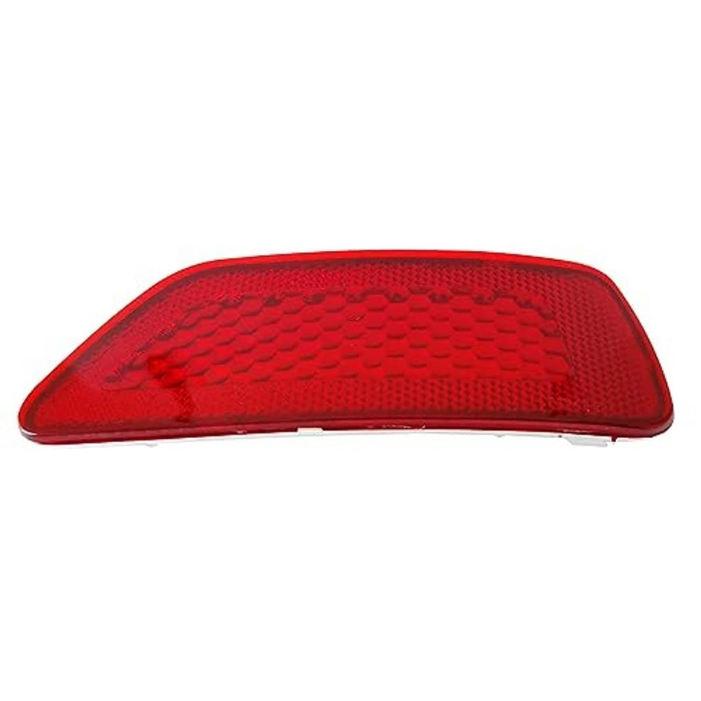 Red rear bumper reflector lens, domed triangular shape with embossed pattern
