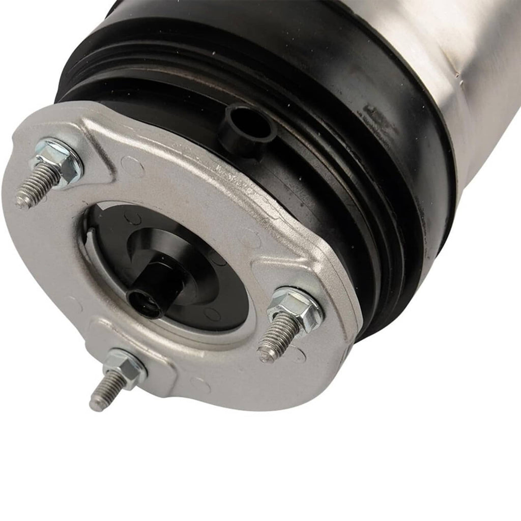 Front air suspension shock strut close-up of lower mounting plate with bolt holes.