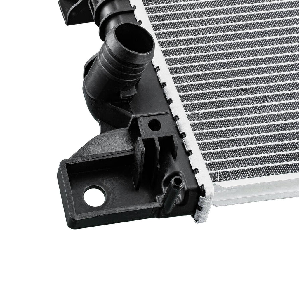 Automotive radiator corner with black inlet outlet housing and silver fin core