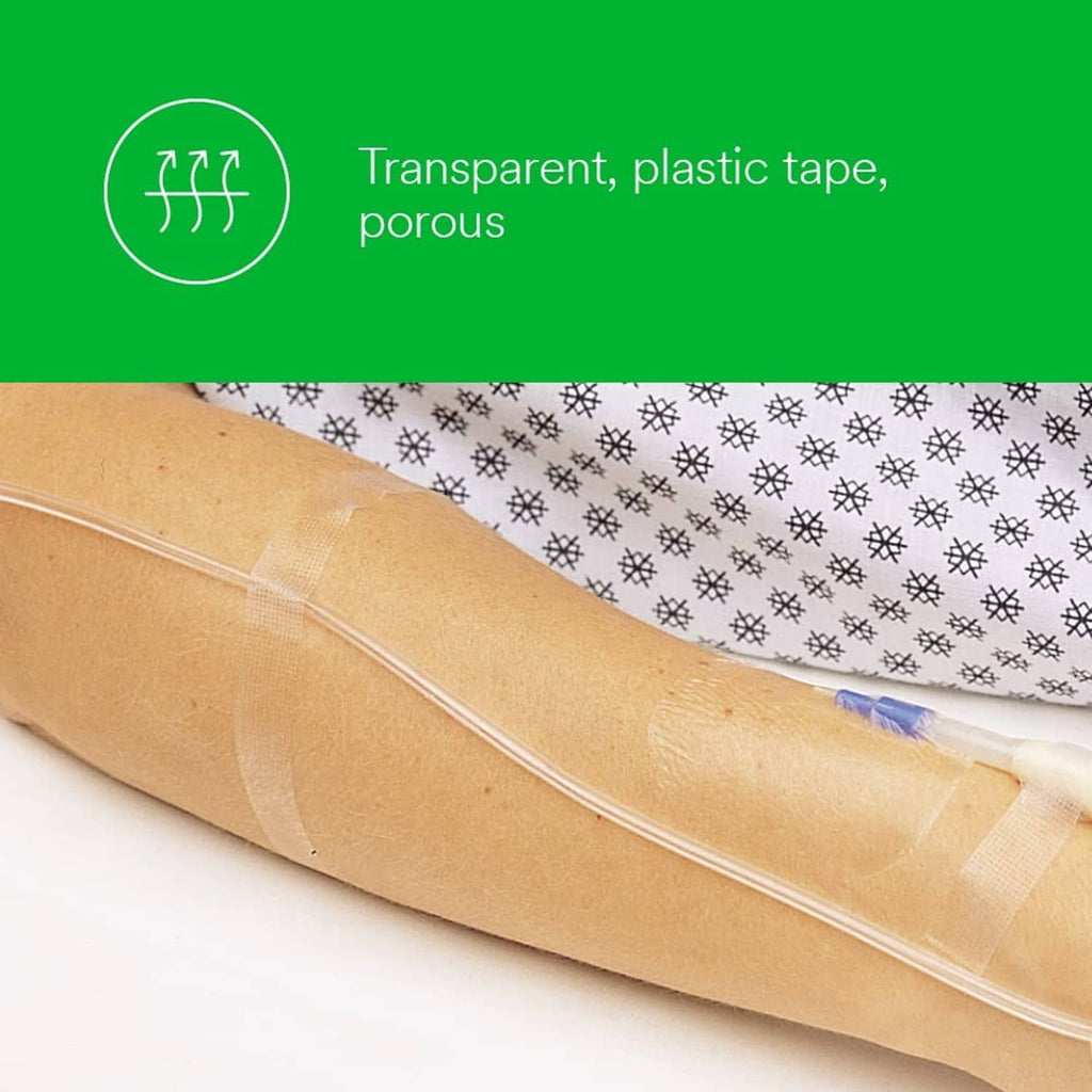Transparent surgical tape strip applied to forearm over gauze