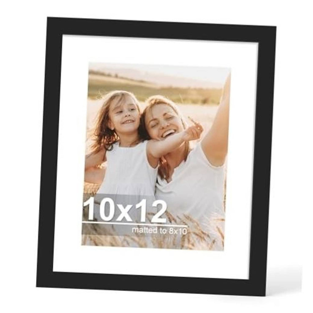 Black 10x12 picture frame with glass and white mat, holding photo of two children