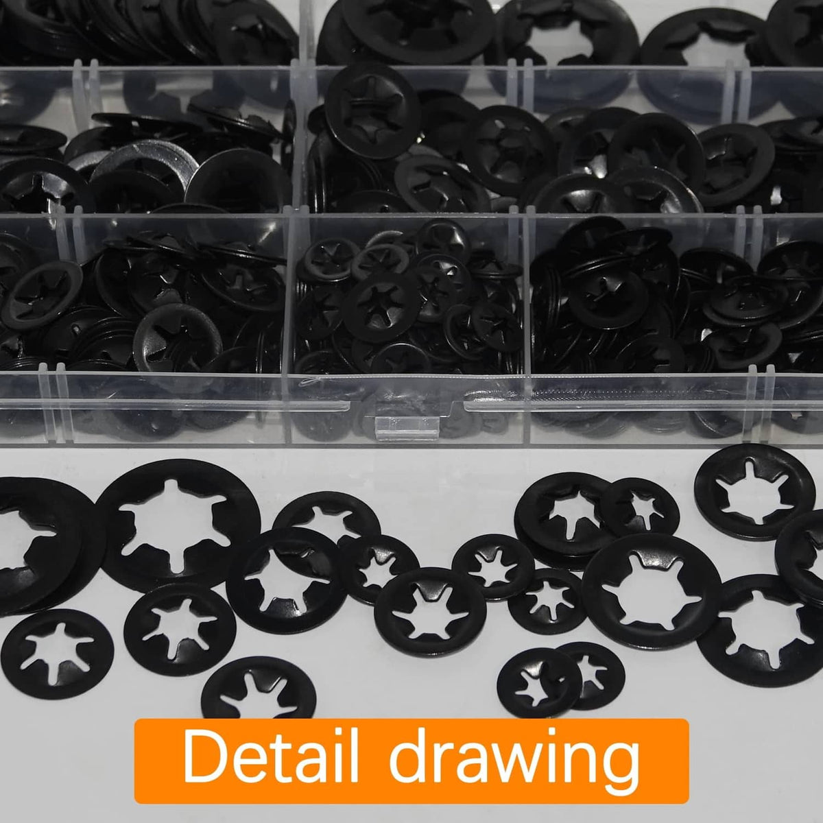 Close-up of black internal tooth star lock washers in clear divided storage