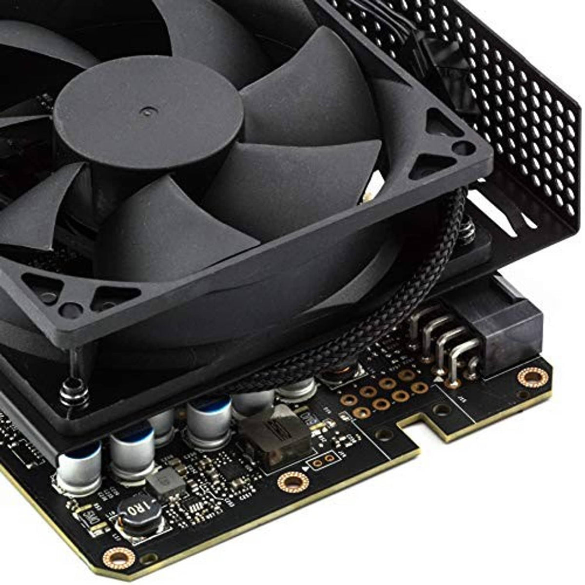 Braided fan adapter cable connected to small circuit board beside cooling fan