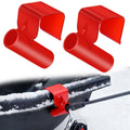 Set of two red plastic ice fishing sled rod holders with angled clamp openings