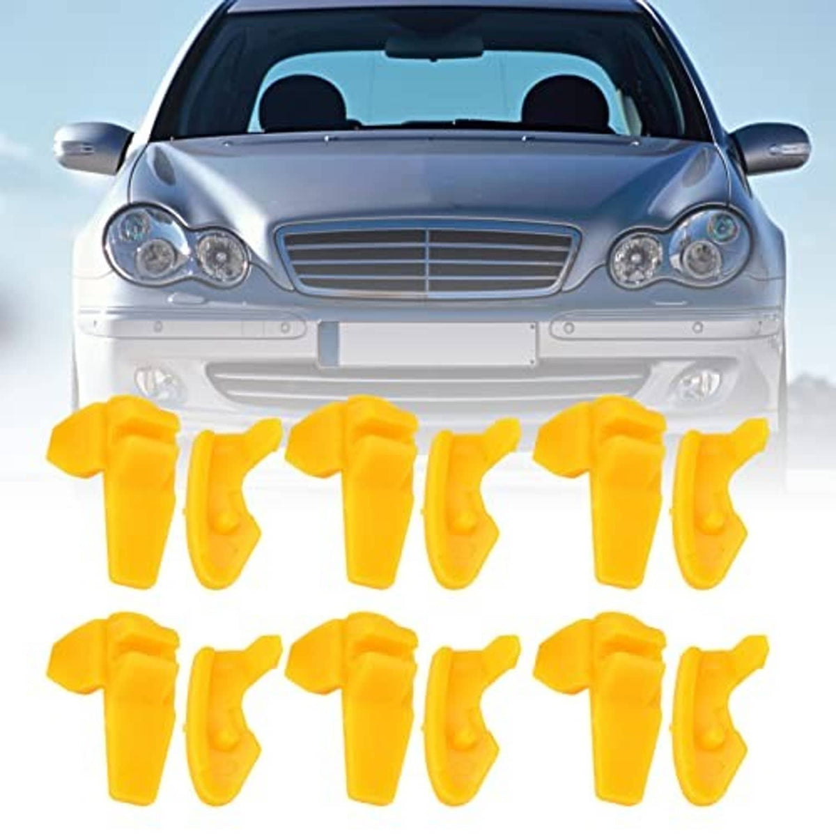 Yellow plastic tire changer duck head inserts near a car front grille
