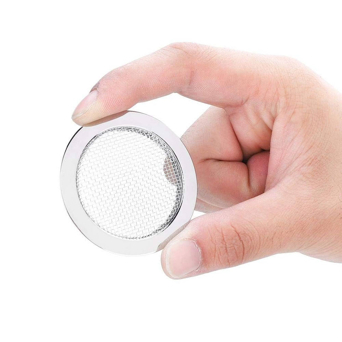 Round silver resonator screen insert with fine metal mesh face, held by hand
