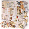 Vintage scrapbook paper and collage sticker assortment pack, butterflies and floral designs
